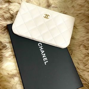 Chanel classic mini o case in white caviar leather
